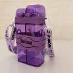 نمای پشت قمقمه دو مخزنه با بند دوشی بلند و قابل‌تنظیم